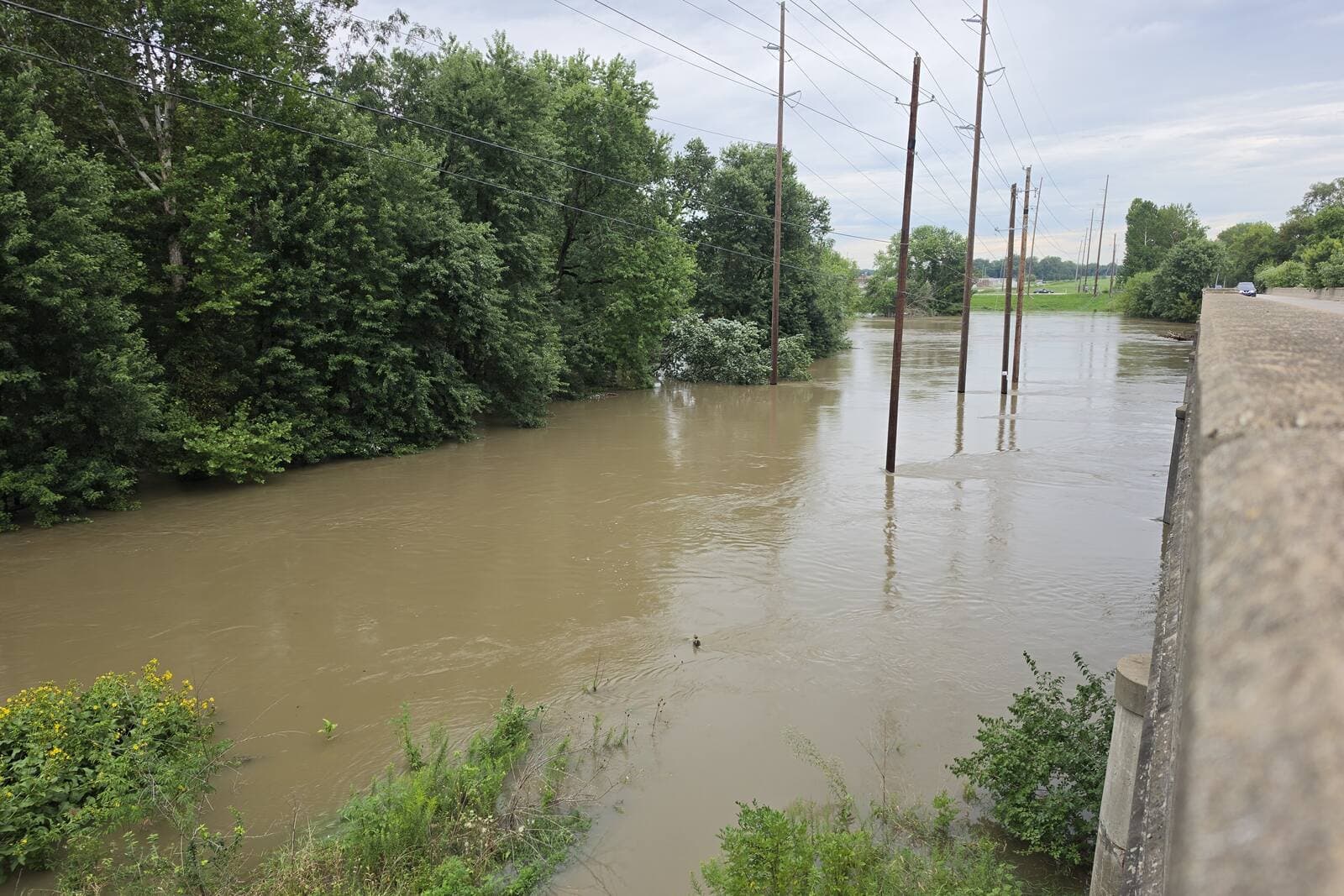 The flooded White River at Southport Road in Indianapolis on August 15, 2026
