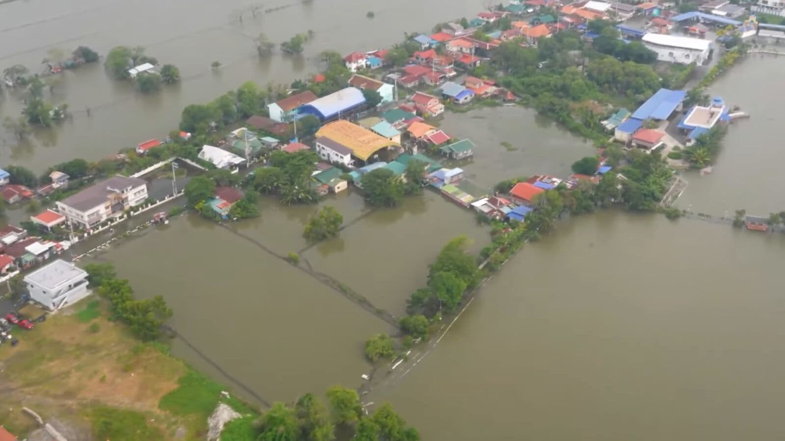 Aerial view of flooded villages and fishponds in Bulacan and Pampanga, August 2026